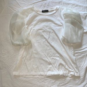 White puffy sleeved top